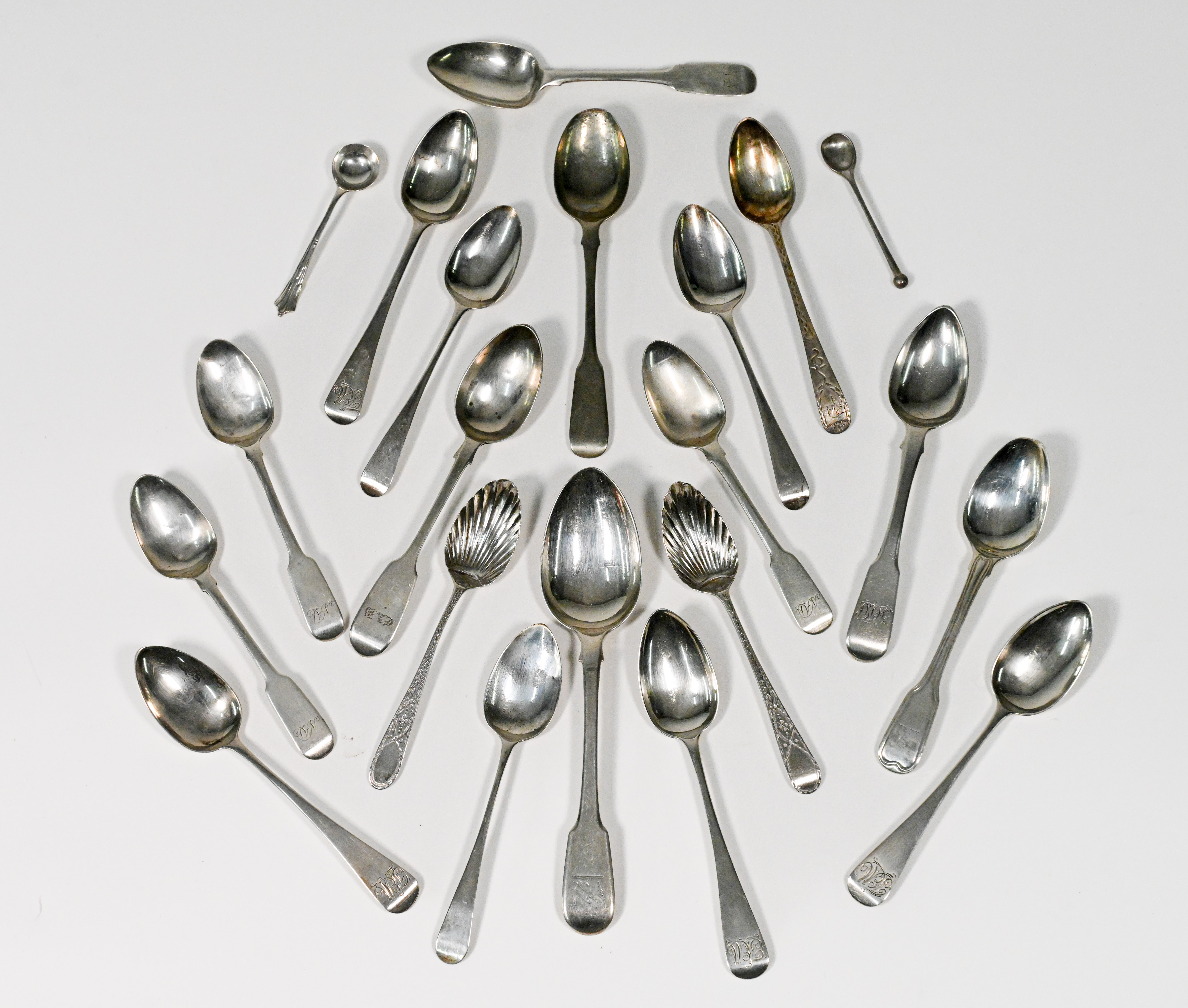 A collection of mainly Georgian silver spoons, approx. 9.64oz (21 spoons including two mustard