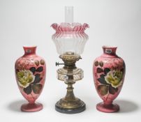 Pair of Victorian opaline and hand painted vases height 34cm, together with an oil lamp with