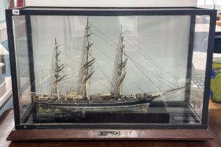 A cased model of the 'Cutty Sark', the glass case measuring, H 67cm x W107cm x D44cm.