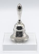 A modern silver bell, with engraving 'Roy & Pamela, 1954/1979', approx 6.28oz.