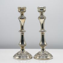 A pair of silver candlesticks, marked 'B & Co Birmingham', height 27cm.