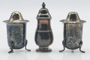 A silver pepper pot together with two silver plated Salt & Pepper pots.