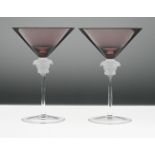 A pair of Rosenthal 'Versace' Medusa head martini glasses, amethyst pink colour, boxed.