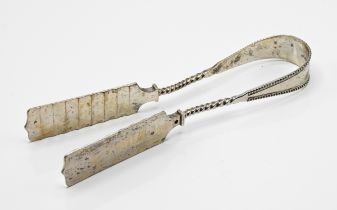 A pair of silver asparagus tongs, indistinct marks, length 23cm, 5.70 oz.