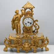 A 19th century French gilt metal and alabaster figure mantle clock, height 43cm.