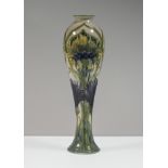 William Moorcroft, Florian ware, cornflower skittle vase, circa 1902. height 24cm