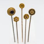 Four 19th century 15ct gold tie pins approx. 5.79g together with another set with cabochon amethyst,
