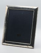 A large sterling silver photo frame, with cloth easel back, 31cm x 26cm, slight damage to top of