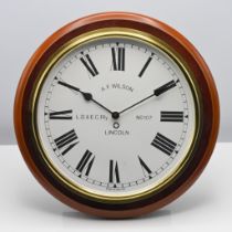 A modern wall clock, dial clock A.Wilson of Lincoln, a replica of LD & E C Railway, diameter 34cm.