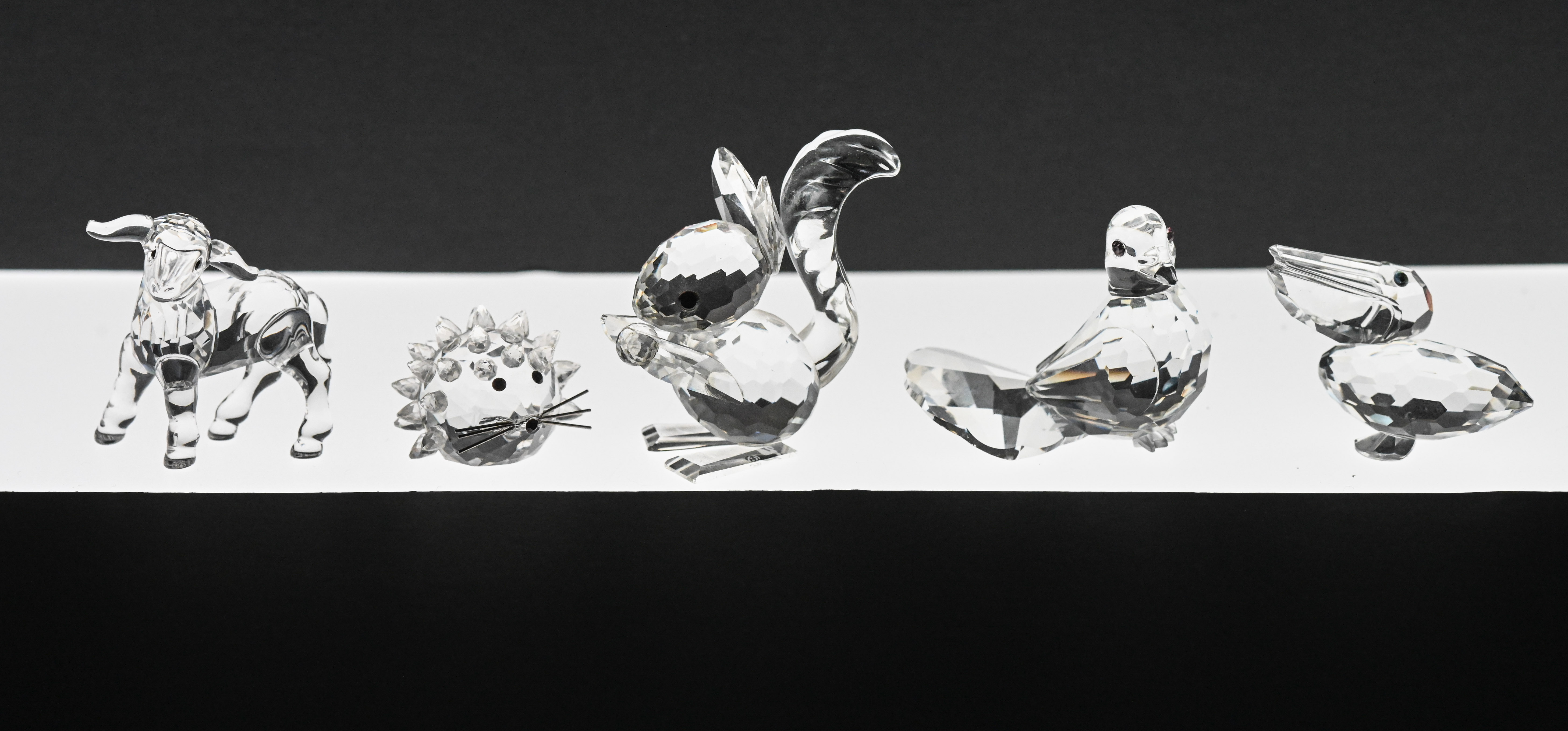 Swarovski Crystal Glass. Five animals to include, Lamb, Hedgehog, Squirrel, Pelican and a Dove,