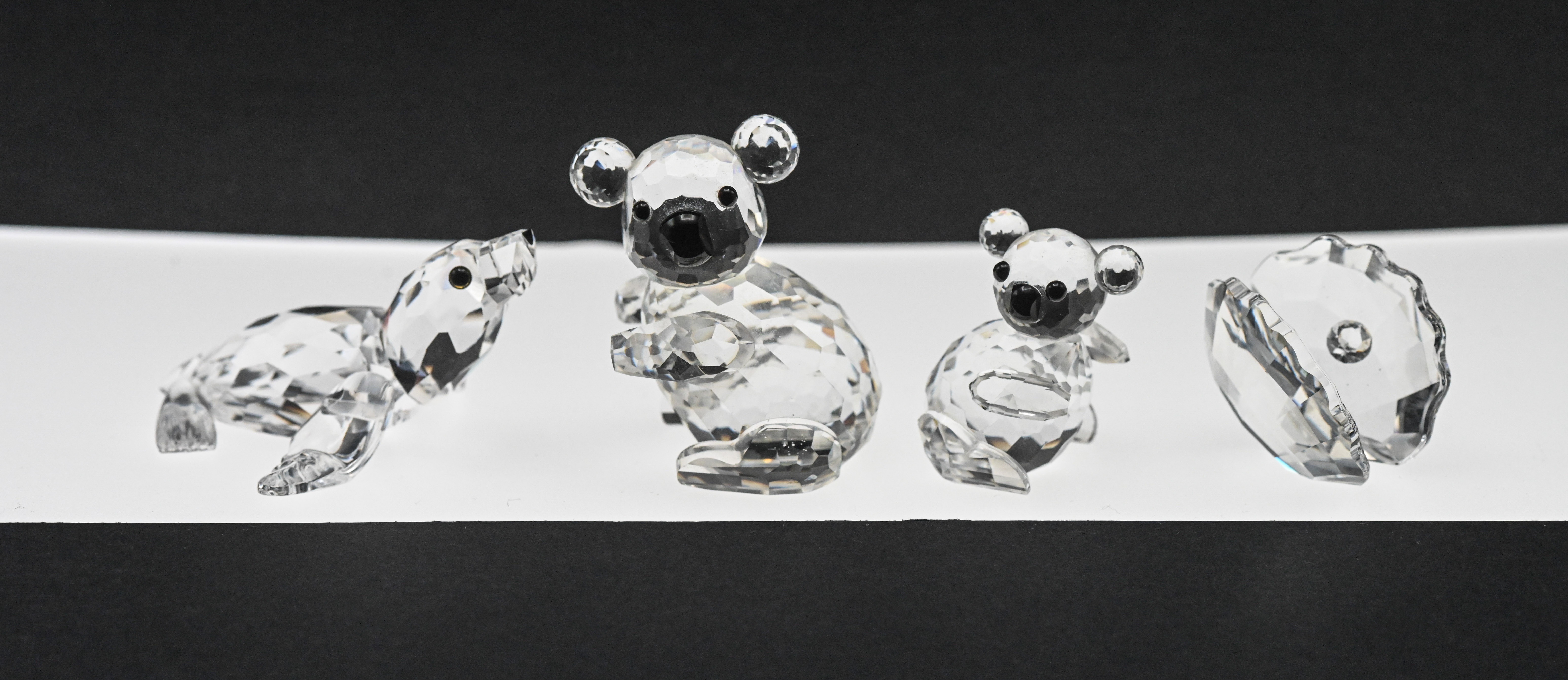 Swarovski Crystal Glass, Two Koala Bears, one Shell and one Baby Seal, boxed.