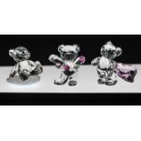 Swarovski Crystal Glass. Collection of three figures to include 'Kris Bear Flowers for you' and '