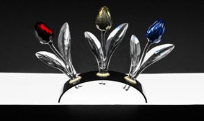 Swarovski Crystal Glass Tulips, to include Yellow, Blue and small Red tulips plus two stands,