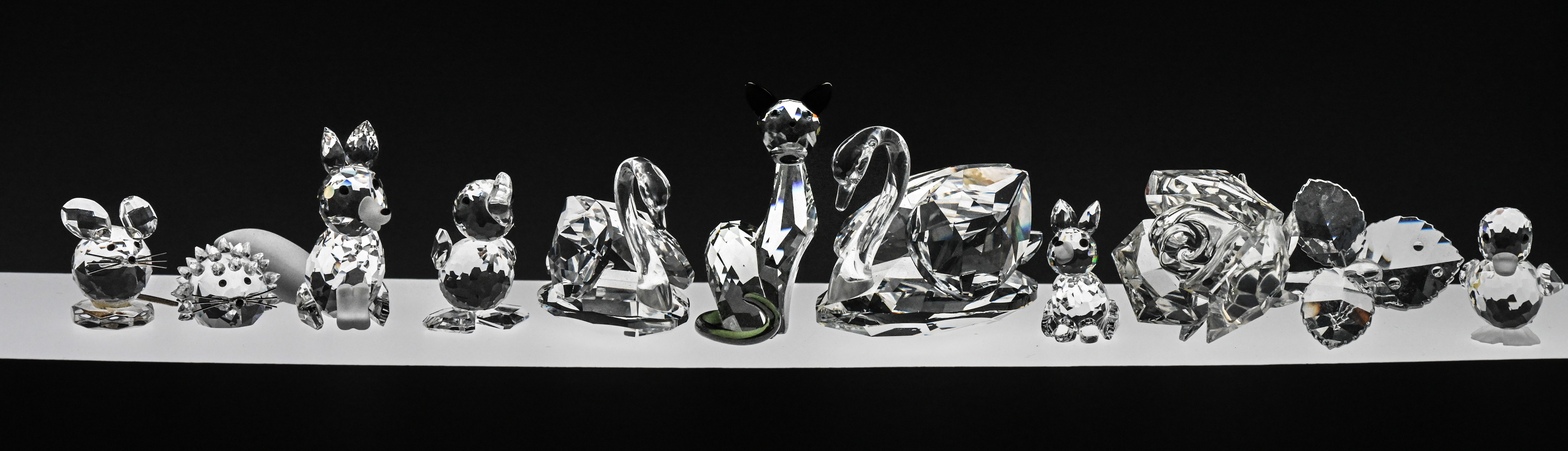 Swarovski Crystal Glass, Collection of ten figures to include Fox, Cat and Swan all unboxed.