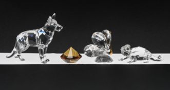 Swarovski Crystal Glass, 'Butterfly', 'Chameleon' and 'German Sheppard', boxed.