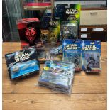 A collection of eight Star Wars figures including Giant Speeder and Theed Palace by Galoob, Darth