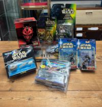 A collection of eight Star Wars figures including Giant Speeder and Theed Palace by Galoob, Darth