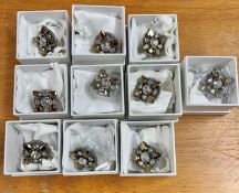 Swarovski Atelier, Collection of ten large cocktail rings, boxed.