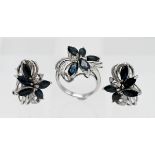 A stylish three piece sapphire and diamond ring and earring group, set in white gold stamped .585,