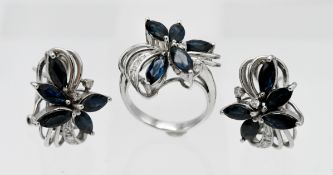 A stylish three piece sapphire and diamond ring and earring group, set in white gold stamped .585,