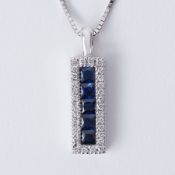 An 18ct white gold pendant set with square cut sapphires, total sapphire weight approx. 0.30 carats,