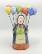 Studio Pottery Figure of the Balloon Seller, signed to base, height 22cm