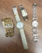 Four various Ladies Guess designer wristwatches. (4)