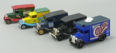A small group of toy model advertising vans to include LLedo and matchbox (5)