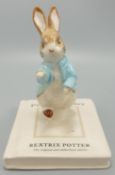 Beatrix Potter figurine Peter on his book P4217, with certificate