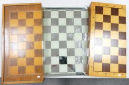 Three Chess Boards including mirror topped glass item & two wooden box type items, largest 45cm x