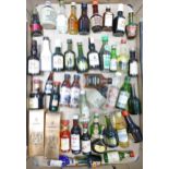 A collection of vintage miniature Spirits, Liquor & Liqueurs including Bols, Lambs Rum, Port, Tia