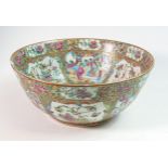 Early 19th century Chinese Canton enamelled punch bowl, decorated with court scenes, foliage &