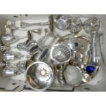 A collection of silver plated items to include wine goblets, napkin rings, candlesticks, bowls,