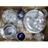 A collection of silver plated items to include footed cake plate, salt & pepper pots, blue glass