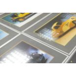 A set of eleven Classical Car theme Framed prints taken from the Ford Calendar, each 39 x 65cm,
