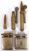 Group of vintage lighters including 2 x brass Trench Art lighters made from bullet casings, and