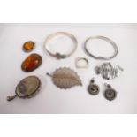 A collection of ladies silver jewellery including Silver amber jewellery, enamelled bracelet, fish