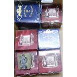 A collection of Boxed Tudor Mint Myth & Magic metal ornaments
