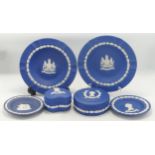 A collection of Wedgwood Queens Blue Commemorative items including plates, pin trays, lidded boxes