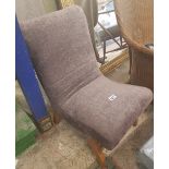 Small re-upholstered child's slipper chair.