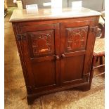 Early 20th century carved dark oak small side cabinet, 63cm W x 82cm H.