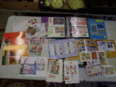 A collection of Disney stamps to include 101 Dalmatians, Narnia, Batman, Brookman 1998 price guide