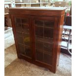 Early 20th century oak glazed bookcase, 85cm W x 100cm H.
