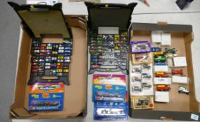 A large collection of Micro Machines Ultra Fast Model toy cars, some carded with additional