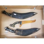 Nepalese Kukri Knifes grip wood and brass finish with miniature daggers together with carved