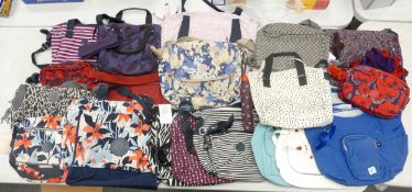 A collection of used Kipling Ladies Handbags & tote bags, two with matching scarfs (19)