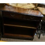 Reproduction mahogany and oak veneer bookcase.