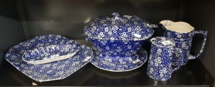 A collection of Burleigh Ware Calico patterned serving items to include soup tureen and ladle, jugs,