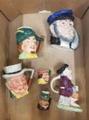 A mixed collection of character and toby jugs to include Melba ware and cooper clayton examples (