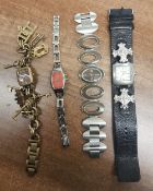 Ladies Fossil designer charm bracelet wristwatch together with three other Fossil wristwatches. (4)